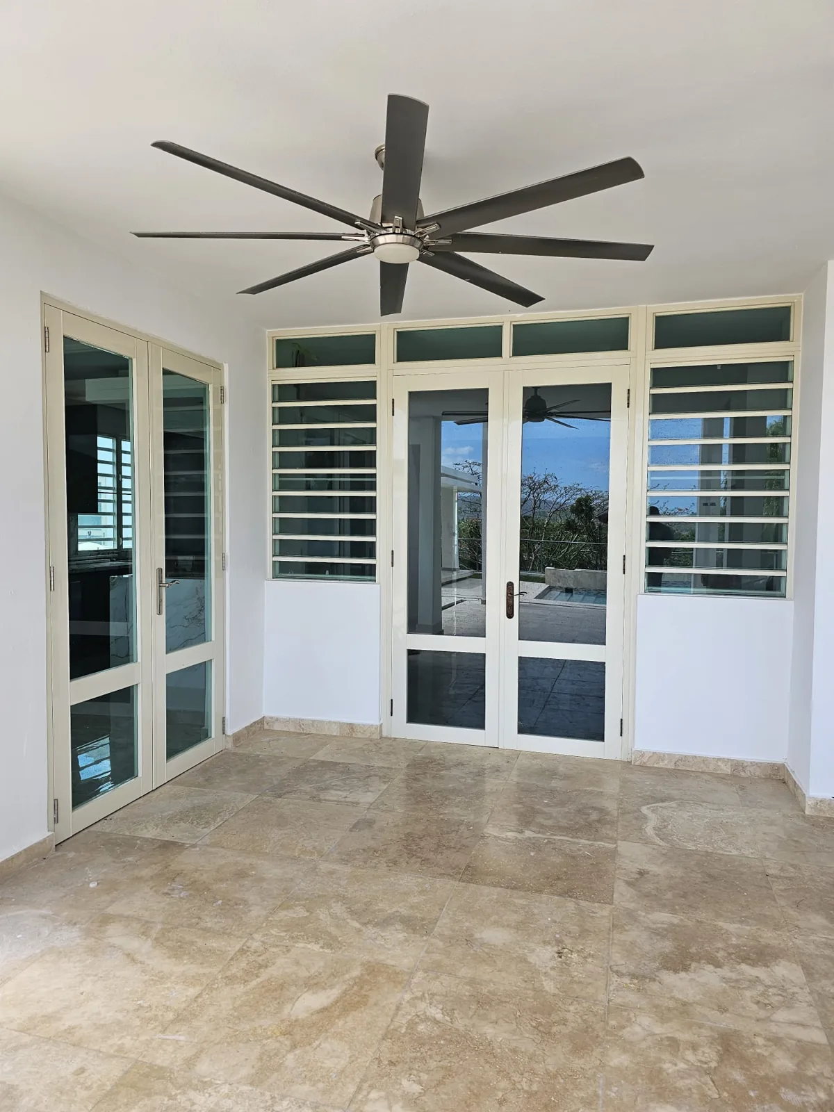 Living room with glass louver windows